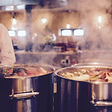 Food Cooking in Steaming Pots