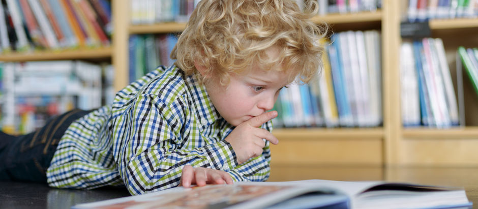 Child reading a book