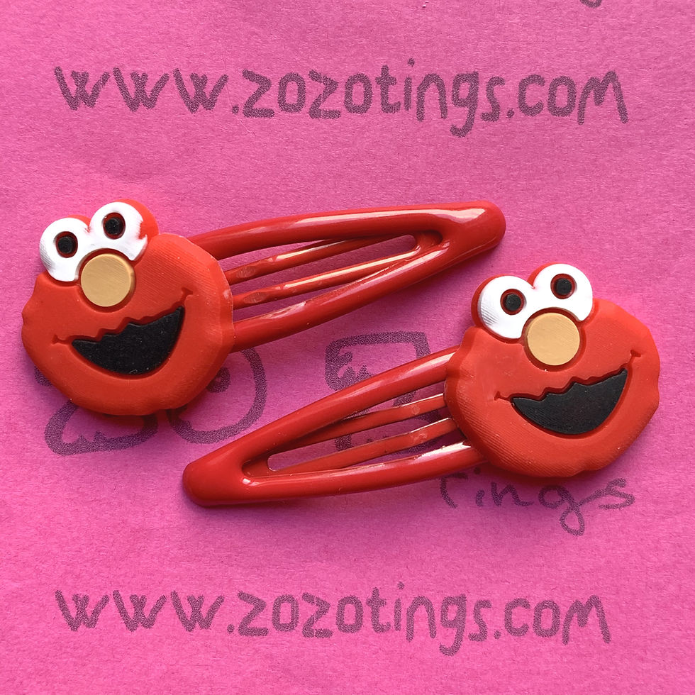 Thumbnail: Elmo & Cookie Monster Snap Hair Clips