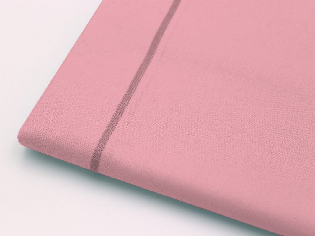 Lenzuolo superiore rosa con elegante rifinitura a cordonetto, realizzato in cotone di alta qualità