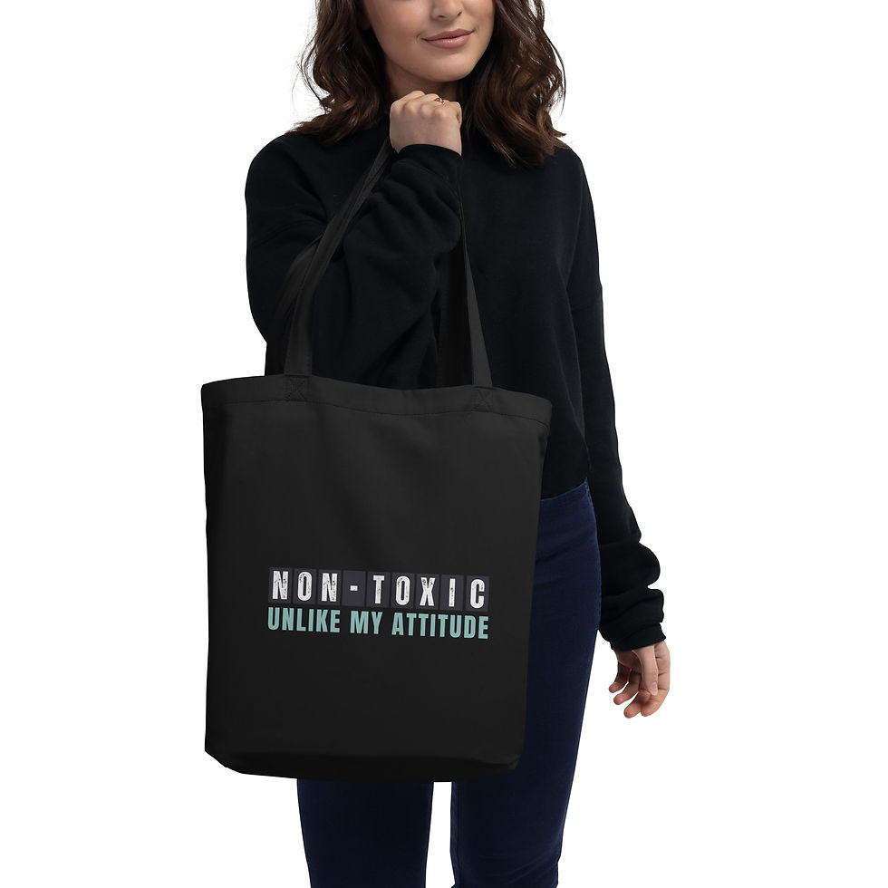 Black Non-Toxic Unlike My Attitude tote bag carried by woman, eco-friendly mum accessory