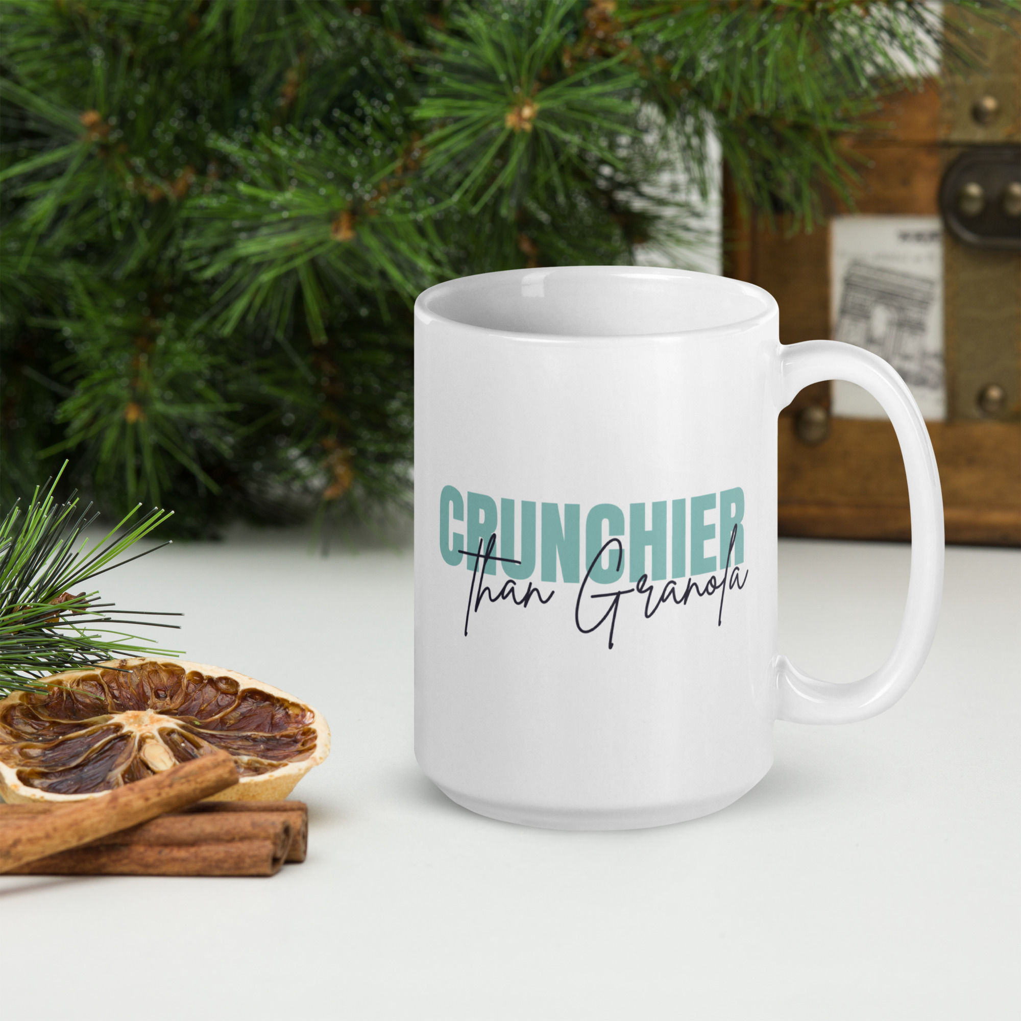 White ceramic coffee mug with green "Crunchier Than Granola" design, eco-friendly crunchy mum gift, sustainable low-tox lifes