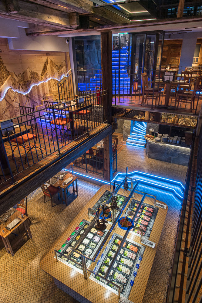 Room view of meat and fish fondue restaurant