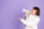 young-brunette-white-casual-sweater-isolated-purple-wall.jpg