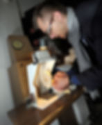 a man Polishing Baltic amber