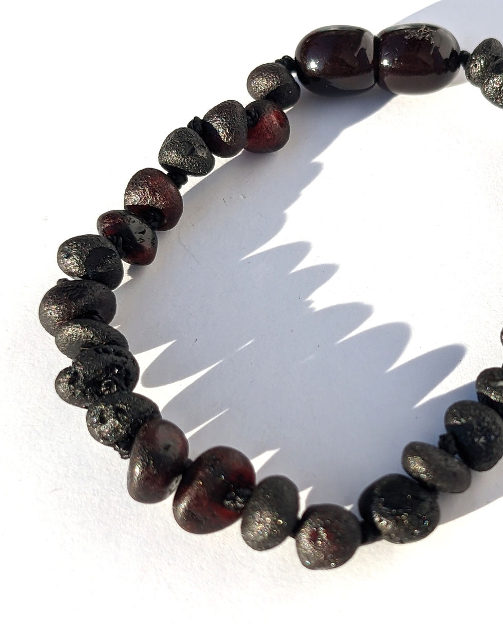 authentic red baltic amber painkilling baby bracelet with plastic screw clasp made from lithuanian baltic amber