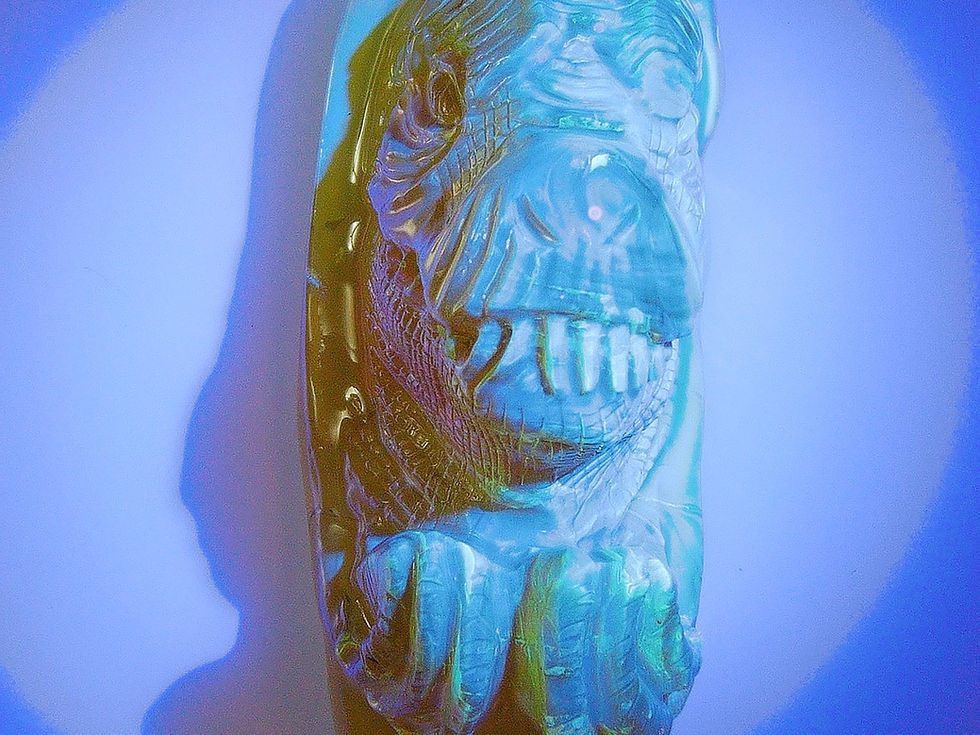 Dominican Amber dyno carving figurine under uv light