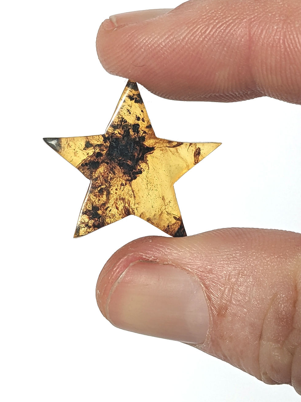 Thumbnail: authentic Mexican Amber star figurine size is 1" x 1"