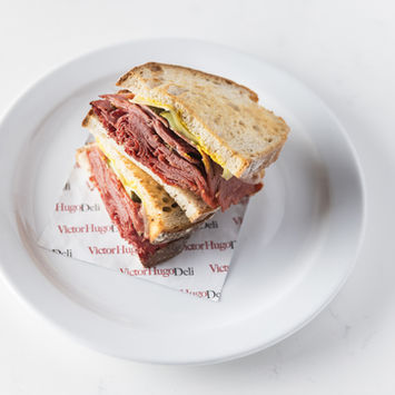Pastrami on Rye sandwich on a plate.