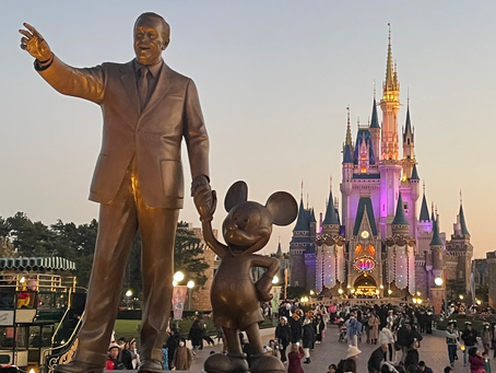 Photo of Walt Disney and Mickey Mouse Statue in front of castle at Disney Tokyo