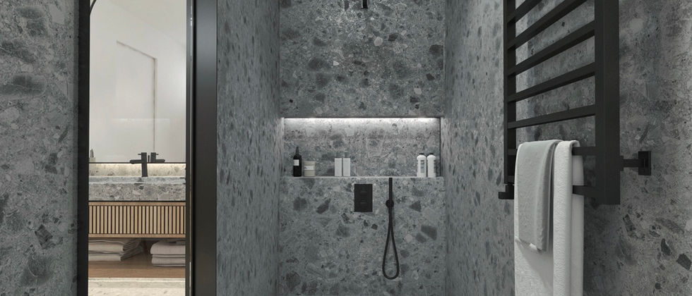 Haus In Wittenau: Detail der Dusche mit grauer Steinverkleidung, schwarzen Armaturen und einem schwarzen Handtuchheizkörper.