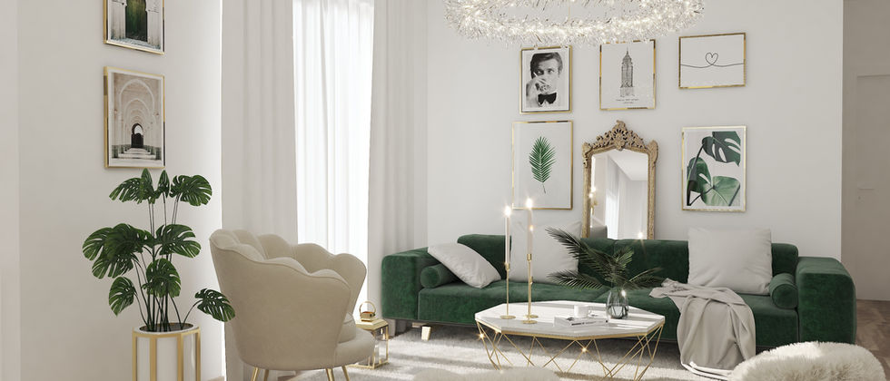 Haus In Lichtenrade: Grünes Sofa und heller Sessel vor einer Bilderwand mit goldfarbenem Spiegel und botanischen Motiven.
