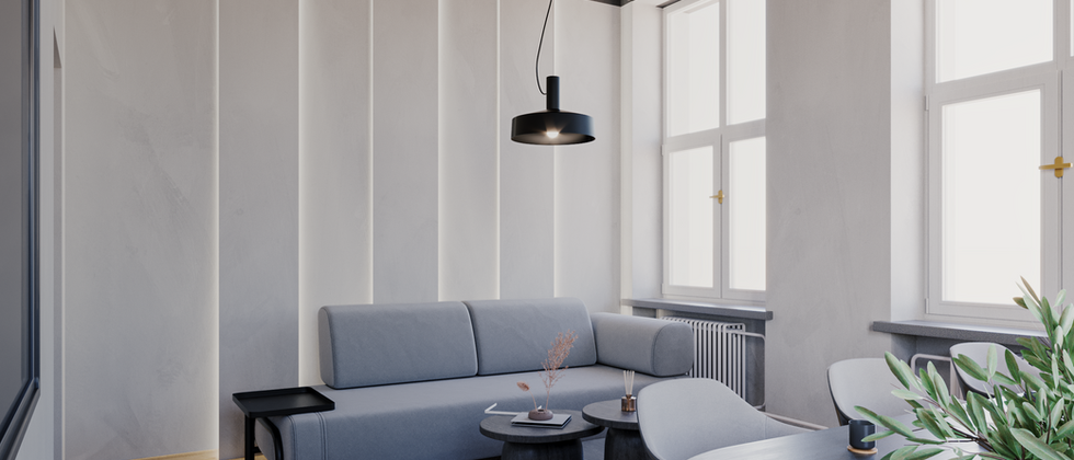 Büro In Stalinbauten Berlin: Heller Aufenthaltsraum mit Sofa, Sesseln, runden Tischen und schwarzen Deckenlamellen.