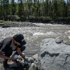 nina collecting rocks.jpeg