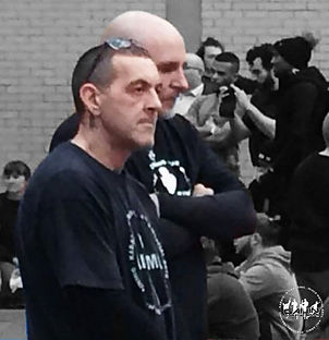 Coaches Kevin Cook & Leonard Woplin view the action