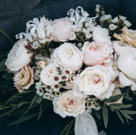 Romantic blush and ivory bridal bouquet with ranunculus and roses at Napa Valley wedding.
