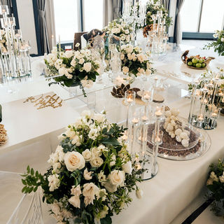 Elegant white Sofreh Aghd at The Westin San Francisco with silver and glass details, floral arrangements, and refined ceremony styling