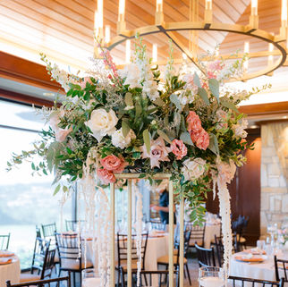 tall wedding floral centerpiece with roses and greenery at San Francisco wedding reception