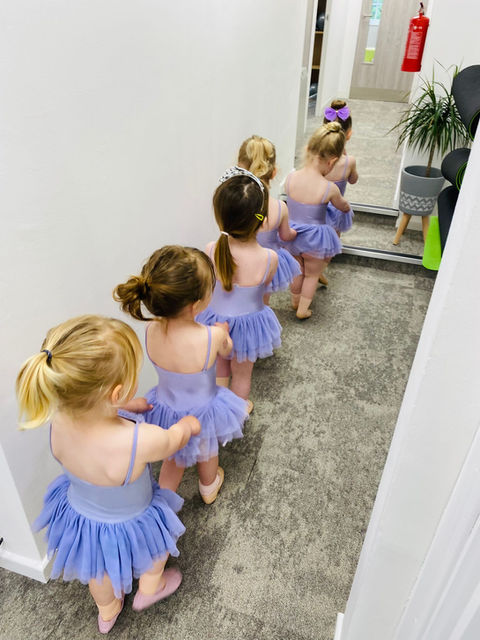 Dancers standing in line
