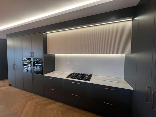 large kitchen with double ovens