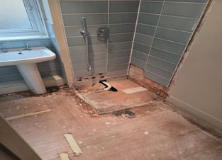 shower where the tray has been removed