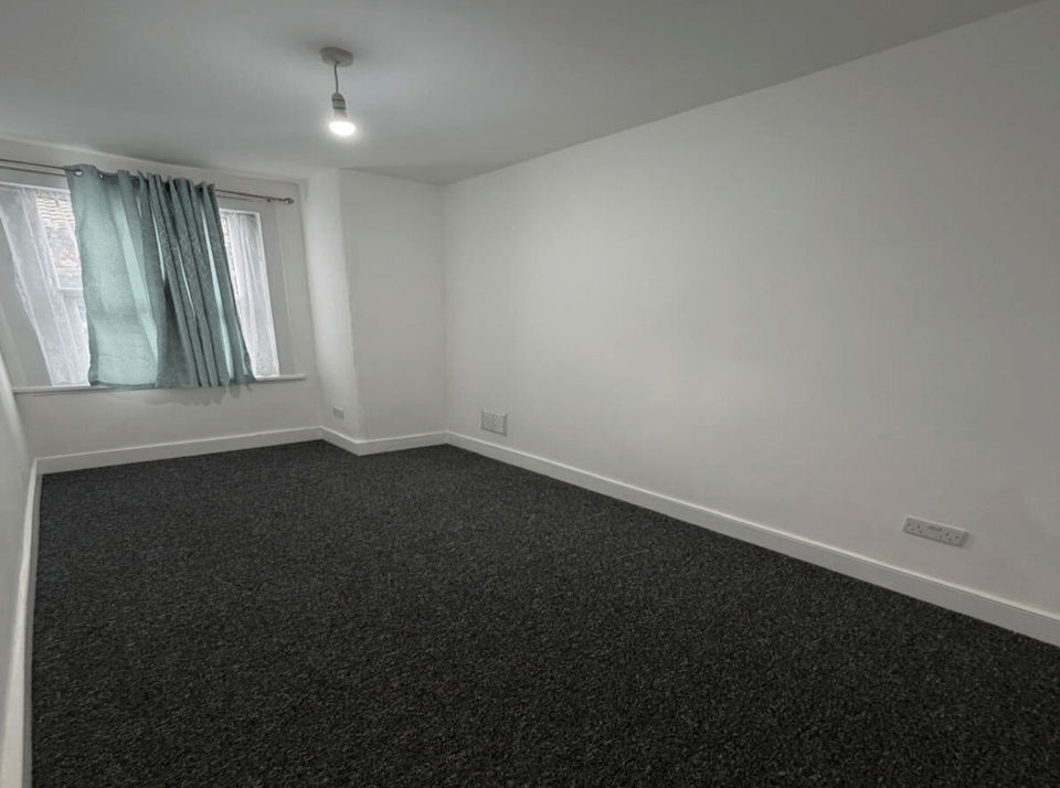 a room with fresh walls and carpet