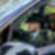 man driving a hearse