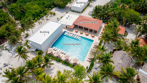 AI rendering of completed pool club and buildings at Casa Pisces