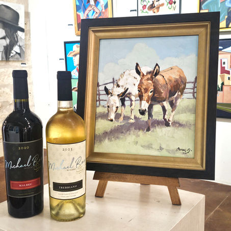Michael Ros wine in the Good Art company with an oil painting of donkies by Omar Garza
