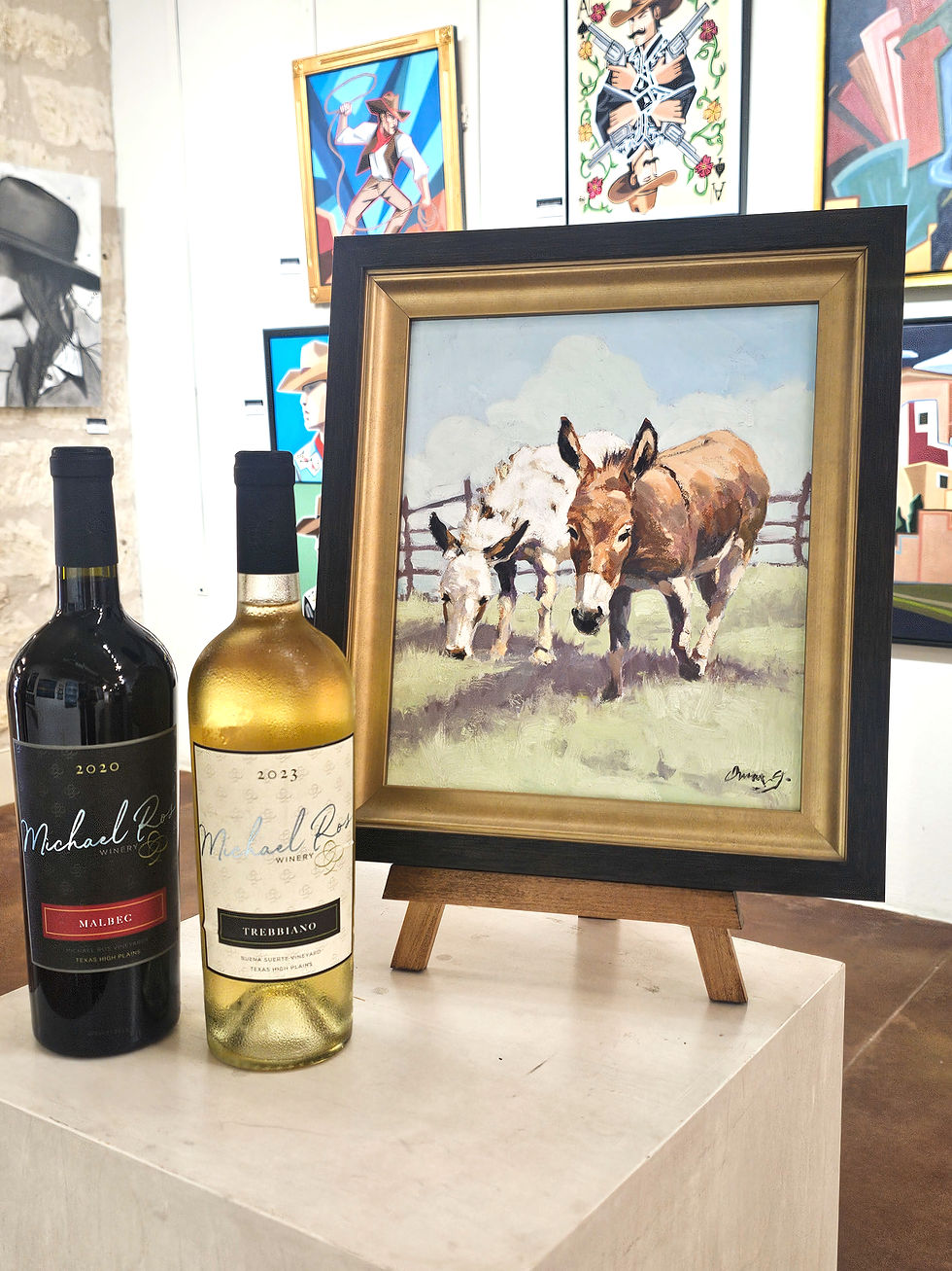 Michael Ros wine in the Good Art company with an oil painting of donkies by Omar Garza