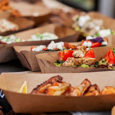 Gourmet Food and Wine festival small bites on to-go brown boat containers