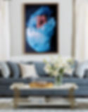 Contemporary living room with a painting of a woman laying down in a blue ball gown is the focal point of the room. Painting by artist Anne-Marie Kornachuk.