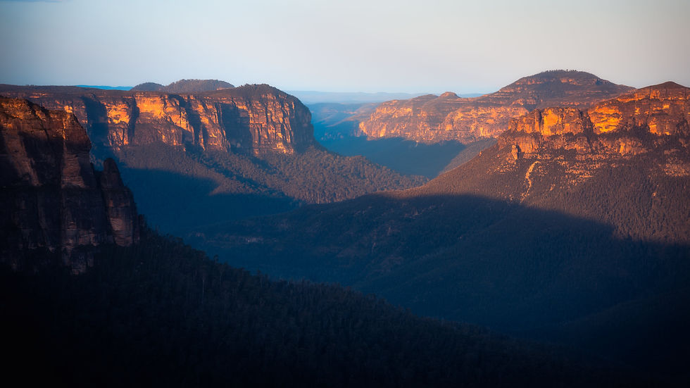 Blue hues can be seen in the air during sunset at Blue Mountains National Park