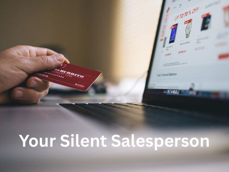 Your Silent Salesperson.  A credit card in a man's hand getting ready to make an online purchase