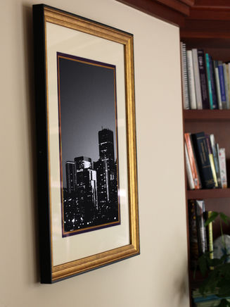 expanse in large golden frame in office room.jpg