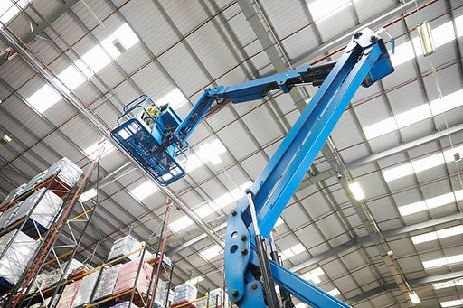 moving-stock-warehouse-with-cherry-picker-low-angle (1).jpg