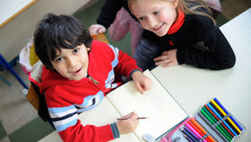 Two primary students in the classroom in school