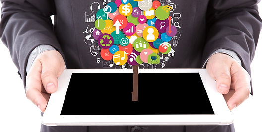 businessman-holding-tablet-with-colorful-icons-min.jpg