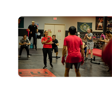 bwl-coach-alex-love-teaching-class-groupofstudents