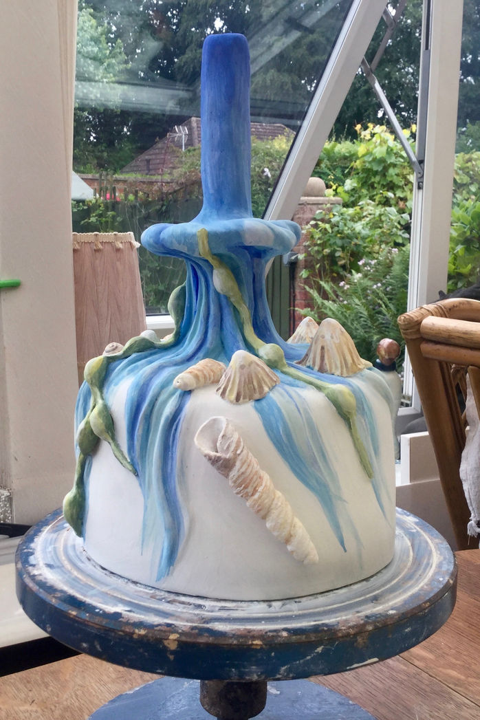 Finished! Six days solid painting underglaze onto both porcelain sculptures...