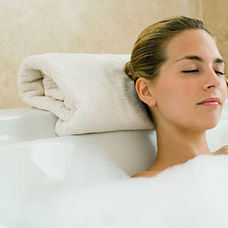 Women in Jacuzzi Tub Relaxing