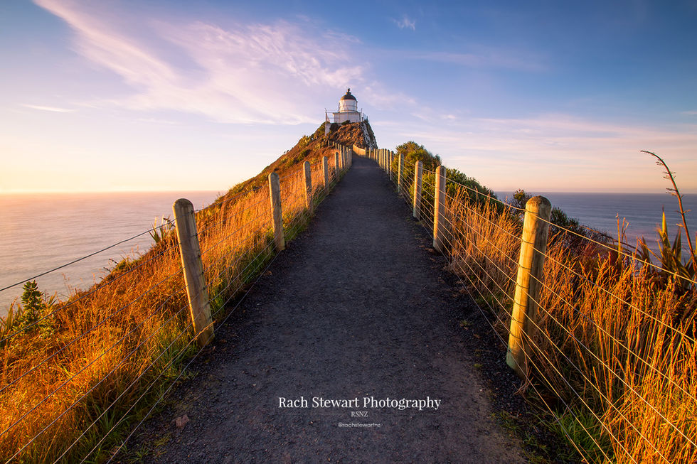 nugget point lighthouse sunrise the catlins new zealand