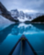 Canoeing on Moraine Lake Canada during winter