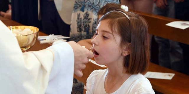 web3-first-communion-children-mass-19-marko-vombergar-aleteia.webp