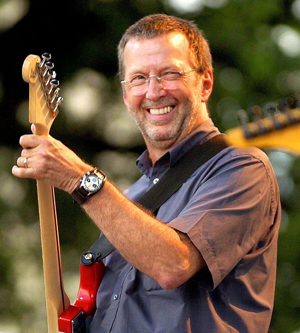 Eric Clapton sobre el escenario con un Rolex Daytona “Paul Newman” en la muñeca.