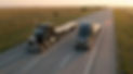 Two_trucks_driving_side-by-side_202605121406.jpeg