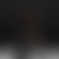 Olesia Glants performing live in Dubai with dramatic lighting and ethereal energy