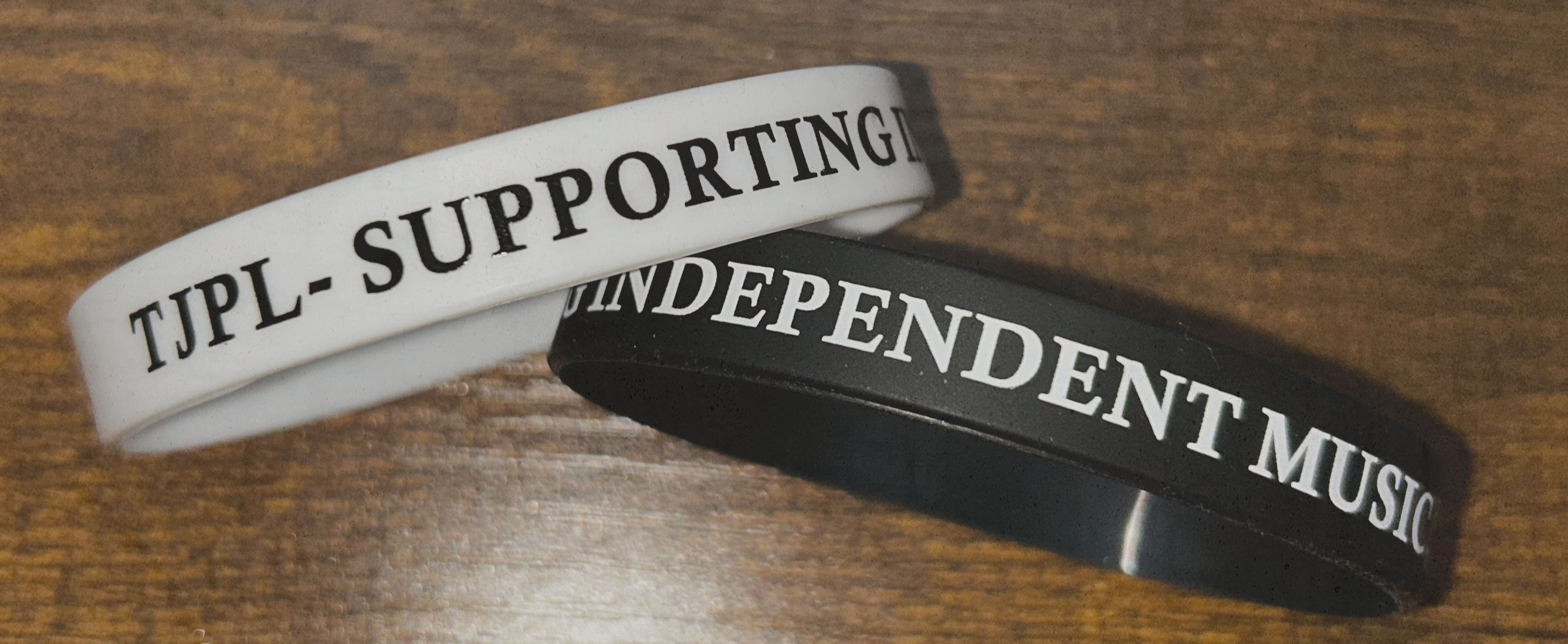 TJPL “Supporting Independent Music” Wristbands (Pack of 2) – Black & White Bands