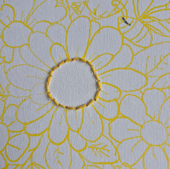 first round of stitches on the canvas