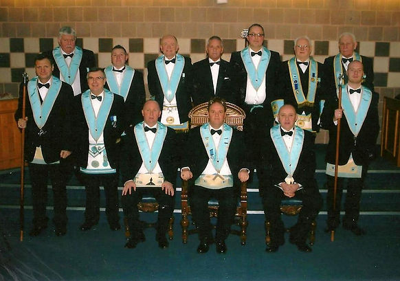 W. Bro. Robert Lenaghan, Abbey Masonic Lodge 180, pictured with his Wardens and Officers after his installation in 2011.